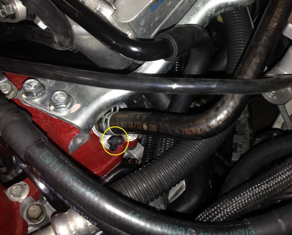 2015 STI Intake Manifold. FPR Reference Nipple circled in yellow.